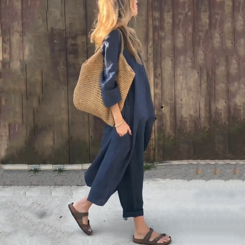 Ensemble deux pièces composé d'un haut et d'un pantalon avec un ourlet haut-bas de couleur unie