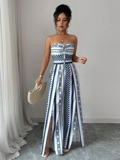 👗 50% DE RÉDUCTION 💥 Combinaison motifs géométriques – Encolure dos nu & fente latérale – Tissu fluide, polyvalente – parfaite pour les soirées ou les vacances ✨