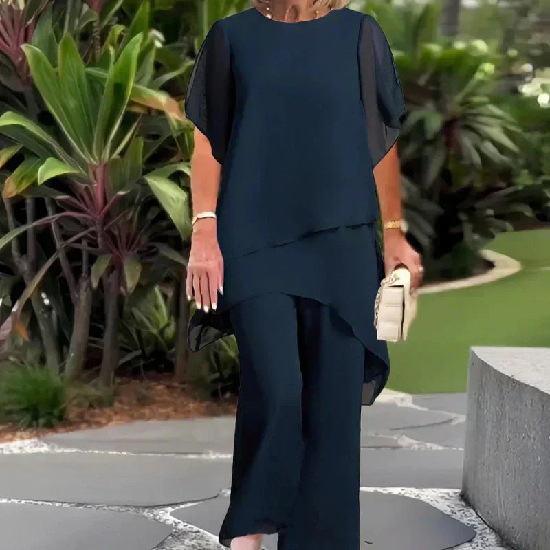 Ensemble composé d'un haut asymétrique charmant et d'un pantalon à jambes larges
