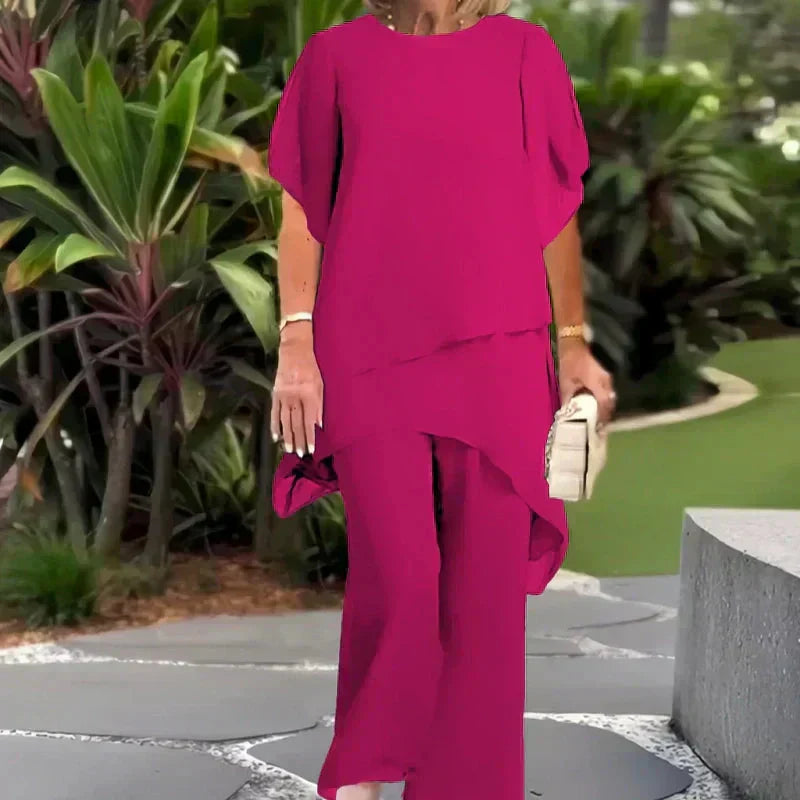 Ensemble composé d'un haut asymétrique charmant et d'un pantalon à jambes larges