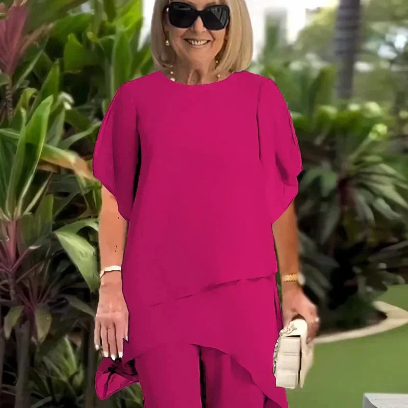 Ensemble composé d'un haut asymétrique charmant et d'un pantalon à jambes larges