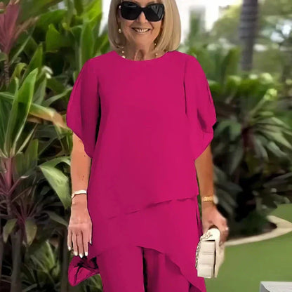 Ensemble composé d'un haut asymétrique charmant et d'un pantalon à jambes larges