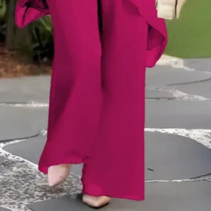 Ensemble composé d'un haut asymétrique charmant et d'un pantalon à jambes larges