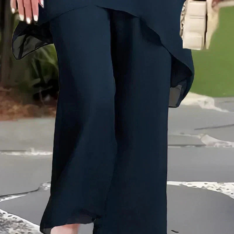 Ensemble composé d'un haut asymétrique charmant et d'un pantalon à jambes larges