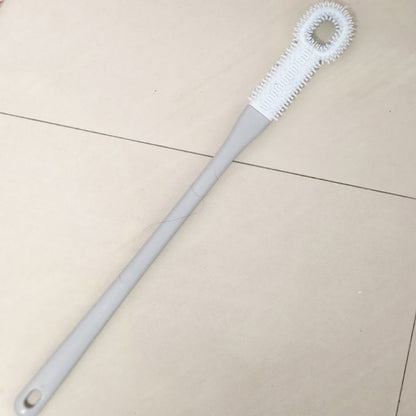 Brosse à long manche pour nettoyer les orteils et les pieds