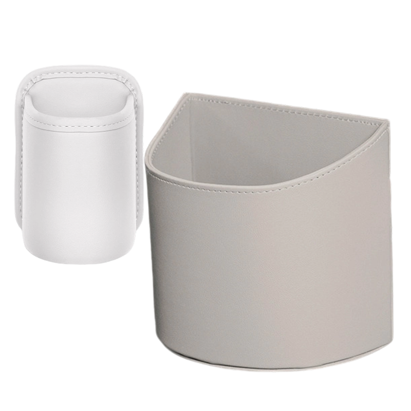 🥳 PROMO EXCEPTIONNELLE 2026 💞 +50 000 exemplaires vendus !  🚗🧺 −50 % sur le porte-gobelet en cuir pour portière auto. ✅ Large ouverture : accès facile aux boissons et au téléphone. 🔒 Fixation par clip, maintien sécurisé. 🛡️ Cuir PU résistant et élégant.