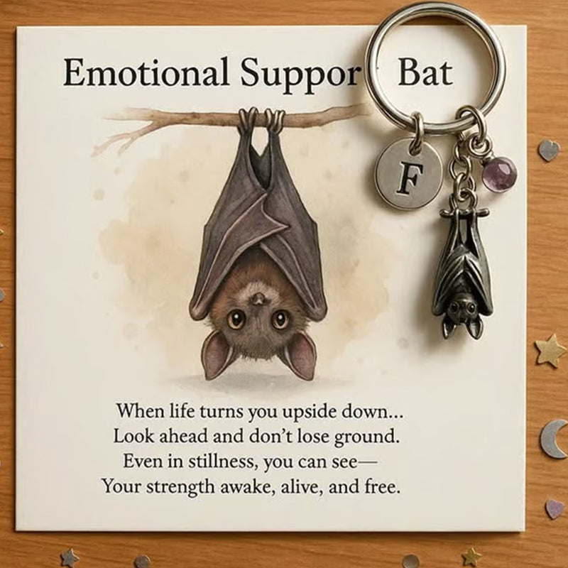 Porte-clés chauve-souris offrant un soutien émotionnel et une carte avec un message