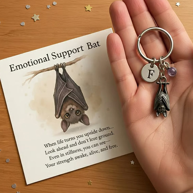 Porte-clés chauve-souris offrant un soutien émotionnel et une carte avec un message