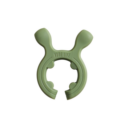 Support multifonction en silicone pour poignées de casseroles et spatules